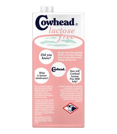 Carton of Cowhead Pure UHT Milk Lactose-Free 1L with clean, white packaging featuring blue and red accents, showcasing its 99.9% lactose-free formula and Halal certification. The packaging highlights its suitability for lactose-intolerant individuals and long shelf life.